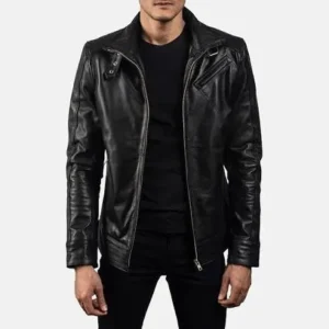 Man wearing a black leather biker jacket over a dark t-shirt and trousers for a custom clothing brand
