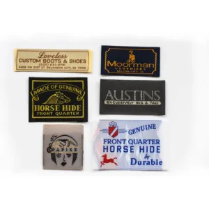 Custom woven labels and patches featuring premium brands like "Loveless Custom Boots," "Moorman Clothiers," and "Genuine Horse Hide."