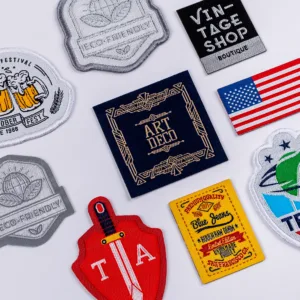 Custom embroidered patches featuring designs such as vintage, eco-friendly, "Art Deco," and American flag themes, perfect for fashion and branding.