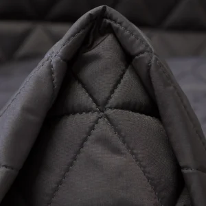 close-up of diamond quilted stitching on a charcoal grey custom fabric