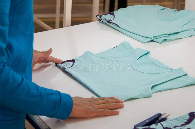 Garment quality checking and packing